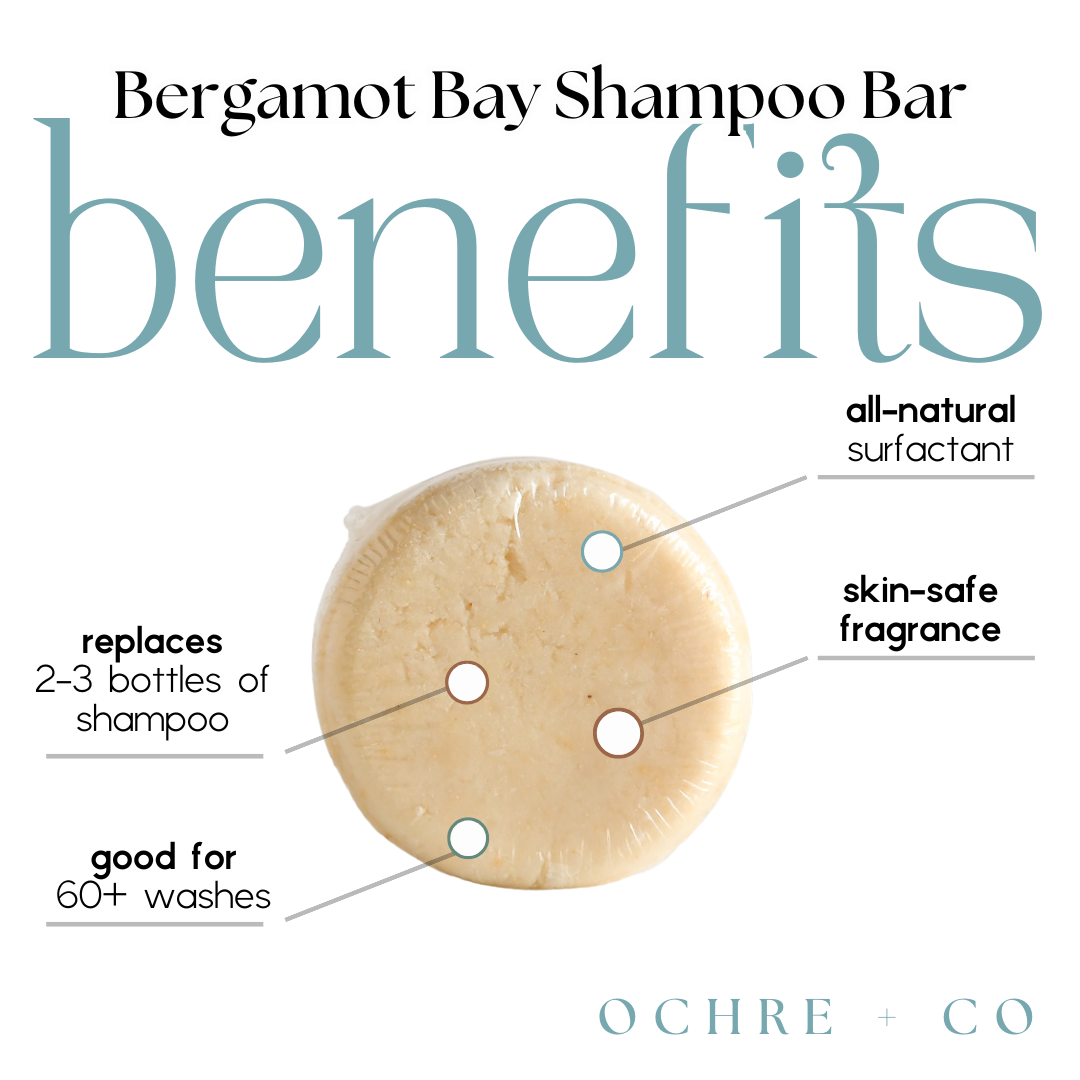 Bergamot Bay Shampoo Bar with labeled benefits on a white background
